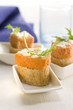 crab pudding on a bite-size slice of bread