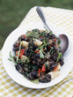 snail fricassée with garlic,tomatoes and rocket