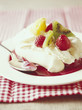 vacherin with fresh fruit and raspberry coulis