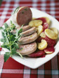 pistachio saucisson from lyon with potatoes and beetroot dressing