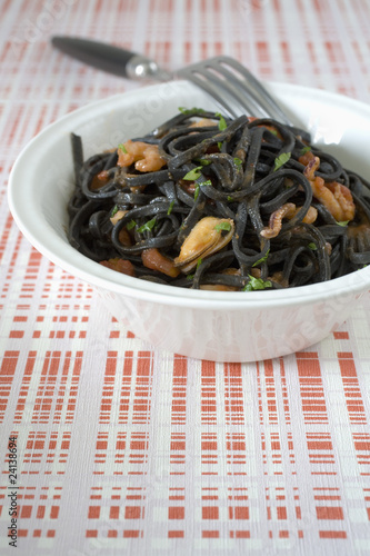 Foto: squid ink tagliatelles with shellfish squid ink tagliatelles with shellfish