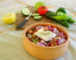 Preparing a Greek salad Preparing a Greek salad