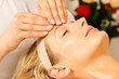 Woman enjoying wellness head massage