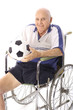 handicap elderly man with soccer ball vertical handicap elderly man with soccer ball vertical