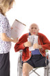 elderly man paying healthcare bills elderly man paying healthcare bills
