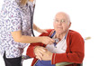 nurse checking elderly mans pulse nurse checking elderly mans pulse