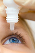 Photo: Oculist applying pipette for patients Oculist applying pipette for patients