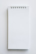 Notebook on the white floor