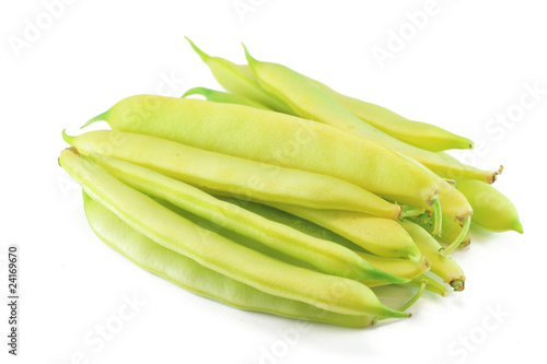 Photo: Pile of yellow wax bean pods isolated on the white background Pile of yellow wax bean pods isolated on the white background