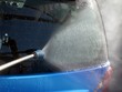 Foto: Autowäsche mit Hochdruckreiniger Autowäsche mit Hochdruckreiniger