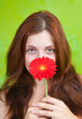 Long-haired girl with red flower