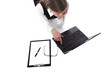 Young attractive lying business woman with a computer Young attractive lying business woman with a computer