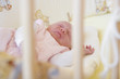 baby in cot
