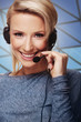 Close-up portrait of friendly telephone operator.