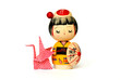 japanese traditional doll and origami isolated