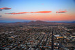 Modern city with mountain at sunset Modern city with mountain at sunset