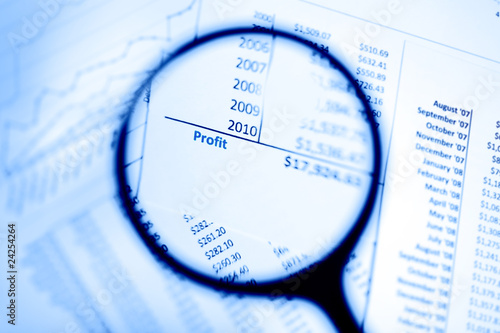 Photo: Magnifying glass showing profit Magnifying glass showing profit