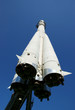 Space rocket on blue sky background