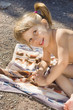 Girl on a towel laughing