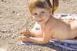 Girl resting on a towel