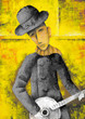 A man, playing banjo