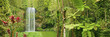Beaatiful panorama shot of tropical Millaa Millaa falls in Austr