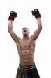 Sexy muscle young man with muay thai gloves