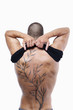 Sexy male's back with tattoo