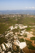 Aerial view at farm fields in front of misty mountains Aerial view at farm fields in front of misty mountains