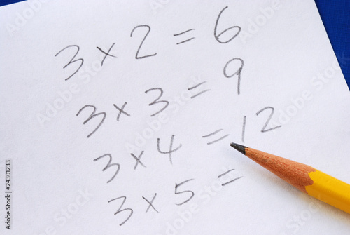 Photo: Practice the multiplication table with a pencil Practice the multiplication table with a pencil