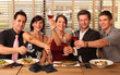 Photo: friends in a restaurant - cheers clink glasses -food friends in a restaurant - cheers clink glasses -food