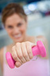 Gym woman with free-weights