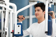 Man at the gym exercising
