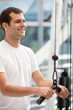 Man at the gym exercising