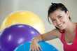 woman with pilates ball