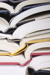 Stacked open books
