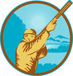Hunter with shotgun  rifle and mountains