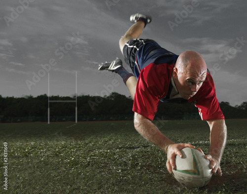 Photo: Rugby Player scoring a Try! Rugby Player scoring a Try!