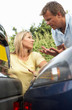 Man And Woman Having Argument After Traffic Accident Man And Woman Having Argument After Traffic Accident