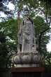 a statue of Buddhist saint a statue of Buddhist saint