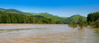 The river in mountains at the summer. A panorama.