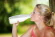 Junge Frau trinkt Milch im Freien, Young woman drinking milk 6 Junge Frau trinkt Milch im Freien, Young woman drinking milk 6