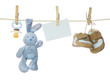 Blue baby goods and blank note hanging on the clothesline Blue baby goods and blank note hanging on the clothesline