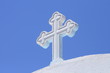 white cross under blue sky