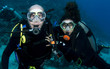 couple scuba diving