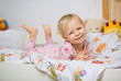 little girl in bed