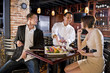 Photo: Japanese sushi restaurant, chef serving customers Japanese sushi restaurant, chef serving customers