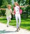 Happy Girls Going to School