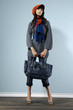 Fashion portrait of young lady with bag Fashion portrait of young lady with bag