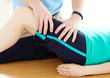 Therapist doing fitness exercises with a woman